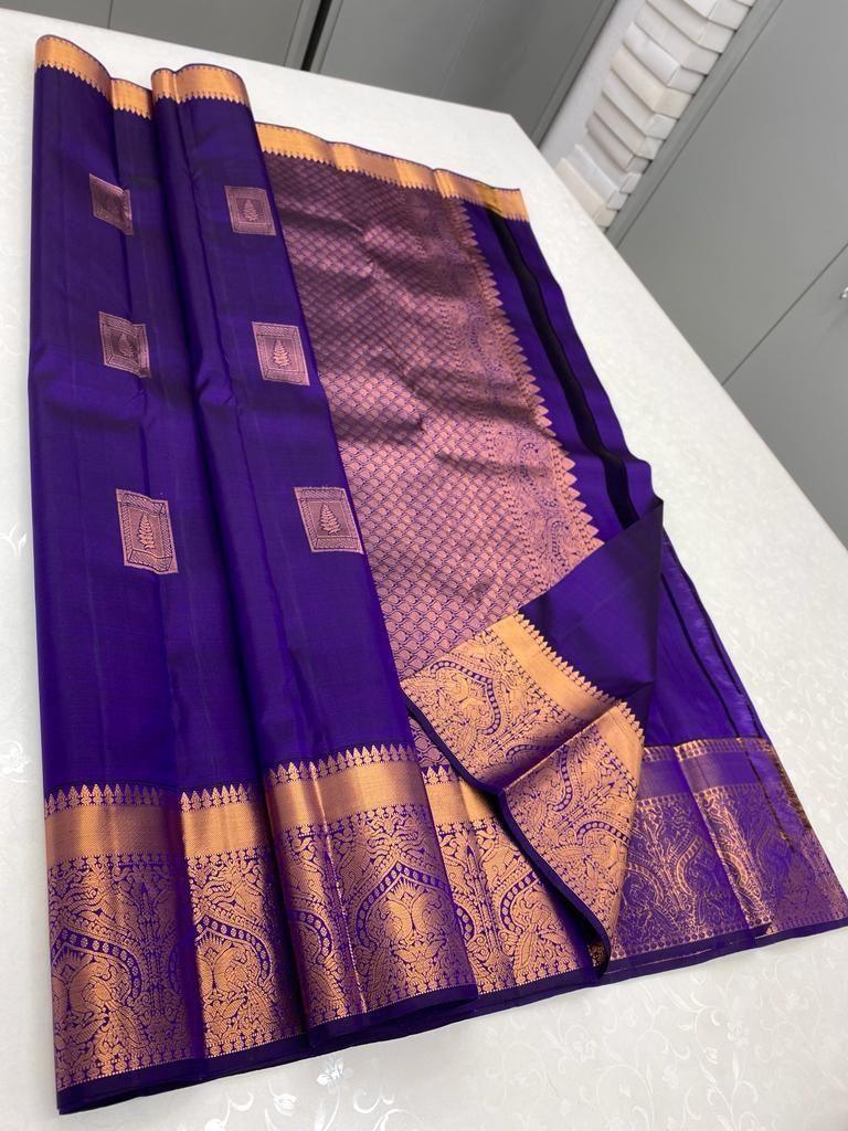 Mesmerizing Blue Square Design Saree with Blouse Piece - Outfit Odessey